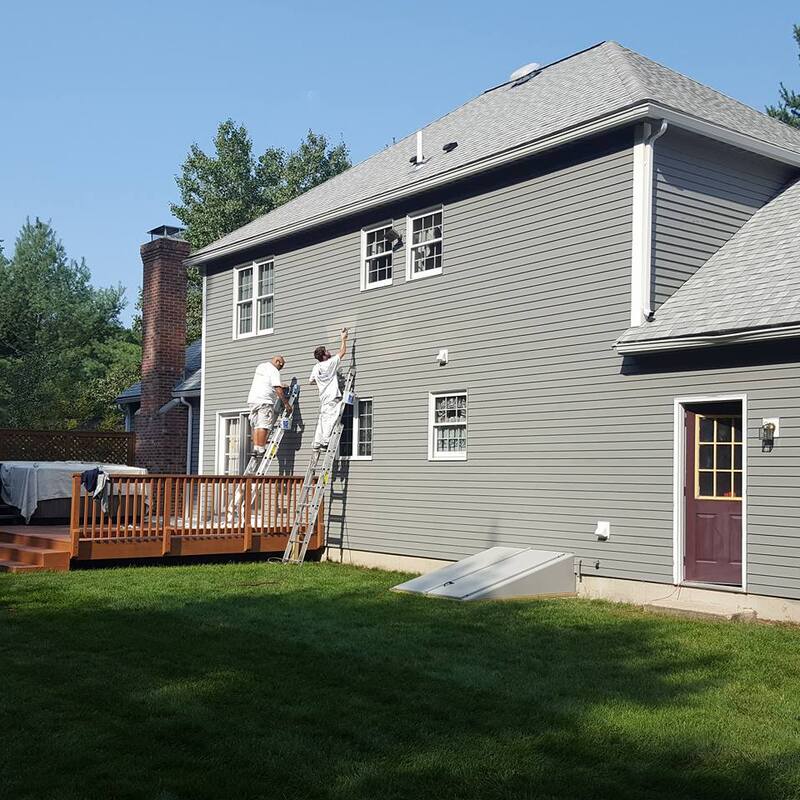 Gray paint touch up on back of newly constructed house