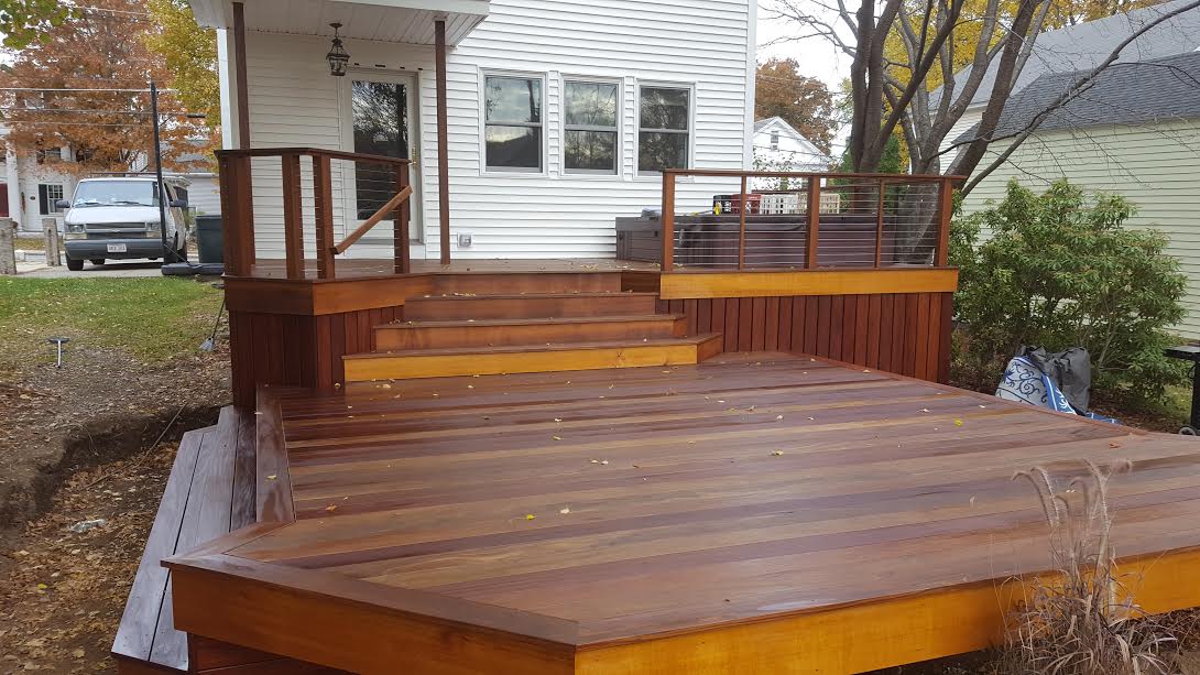 Freshly stained two level deck in walnut