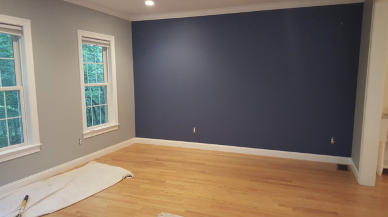 Gray walls with blue accent wall